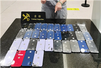 海關(guān)查獲2人身纏74臺(tái)iPhone入境：全是“洋垃圾”